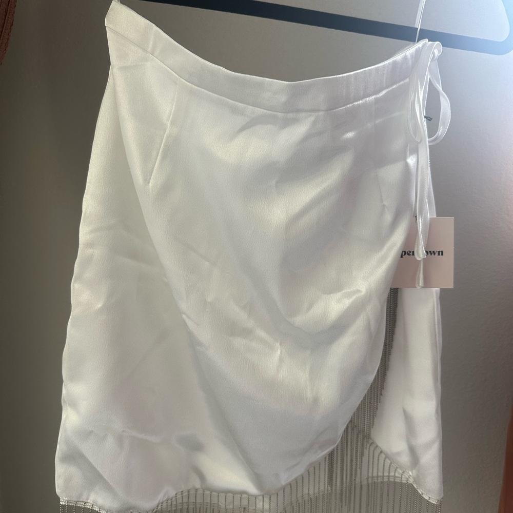 White fringe skirt. Perfect for a bachelorette day.
